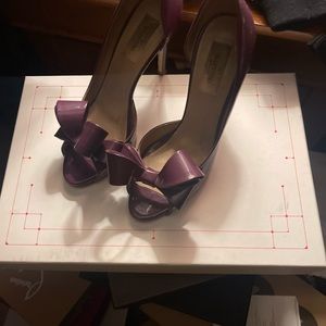 - Beautiful well kept pumps (egg plant color) no box included